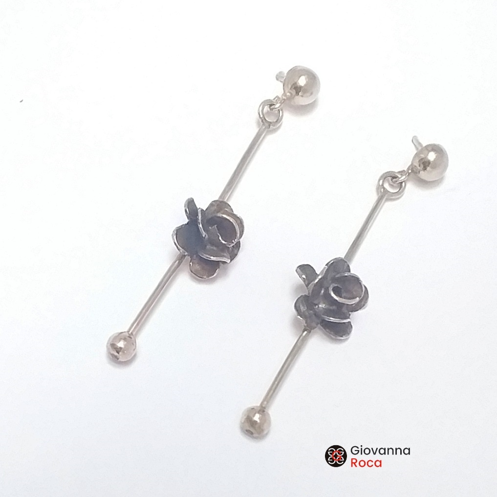 Aretes rosa ancestral