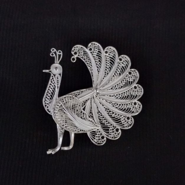 Prendedor pavo real